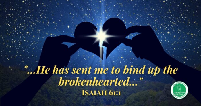 Hands Holding Broken Heart - Quotation from Isaiah 61:1 "...He has sent me to bind up the brokenhearted..."